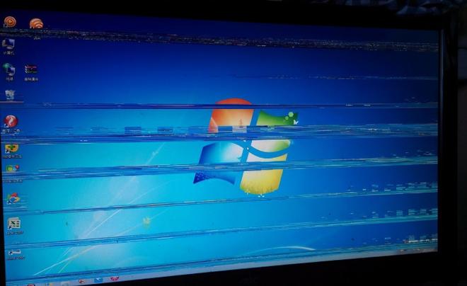 电脑花屏横条闪烁怎么修复（电脑显示器花屏解决方案）
