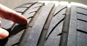 前轮胎磨损严重是什么原因
