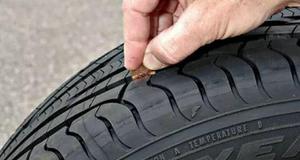 前轮胎边缘磨损严重什么原因造成的
